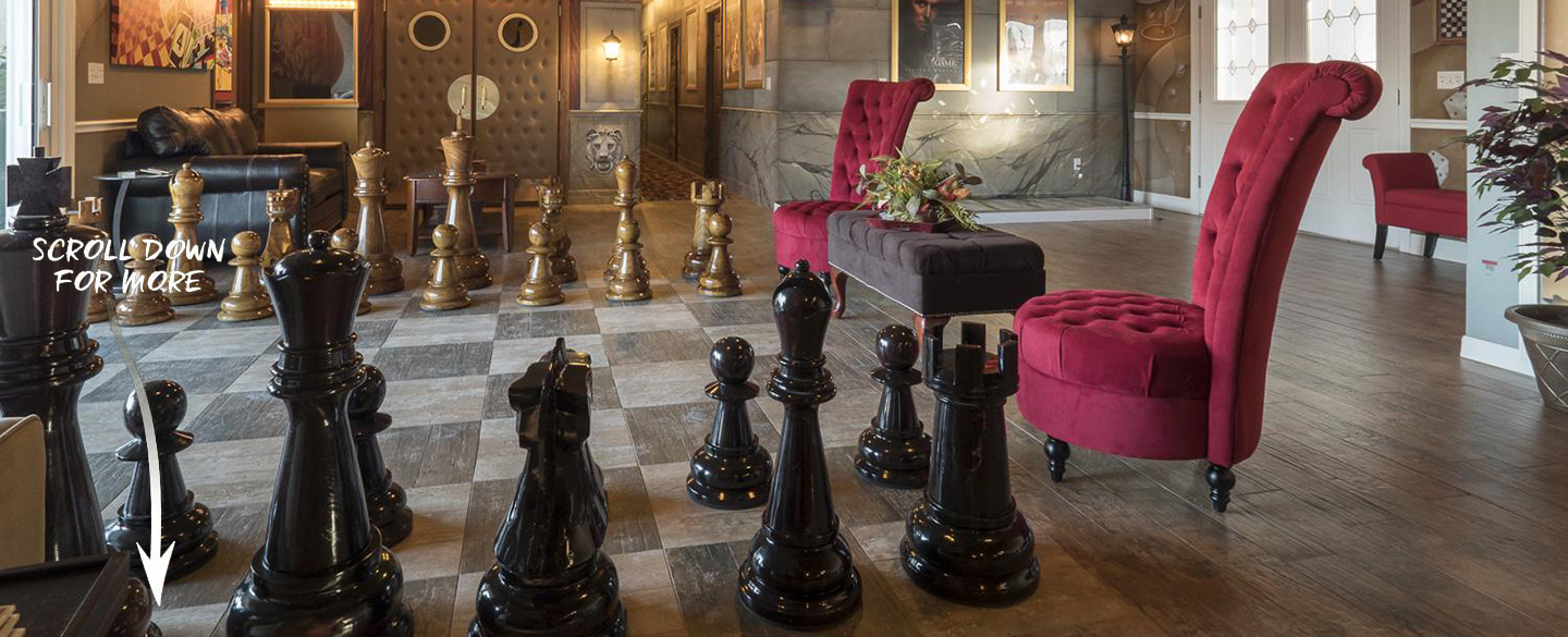 a chessboard floor made from ceramic tile with giant megachess chess pieces