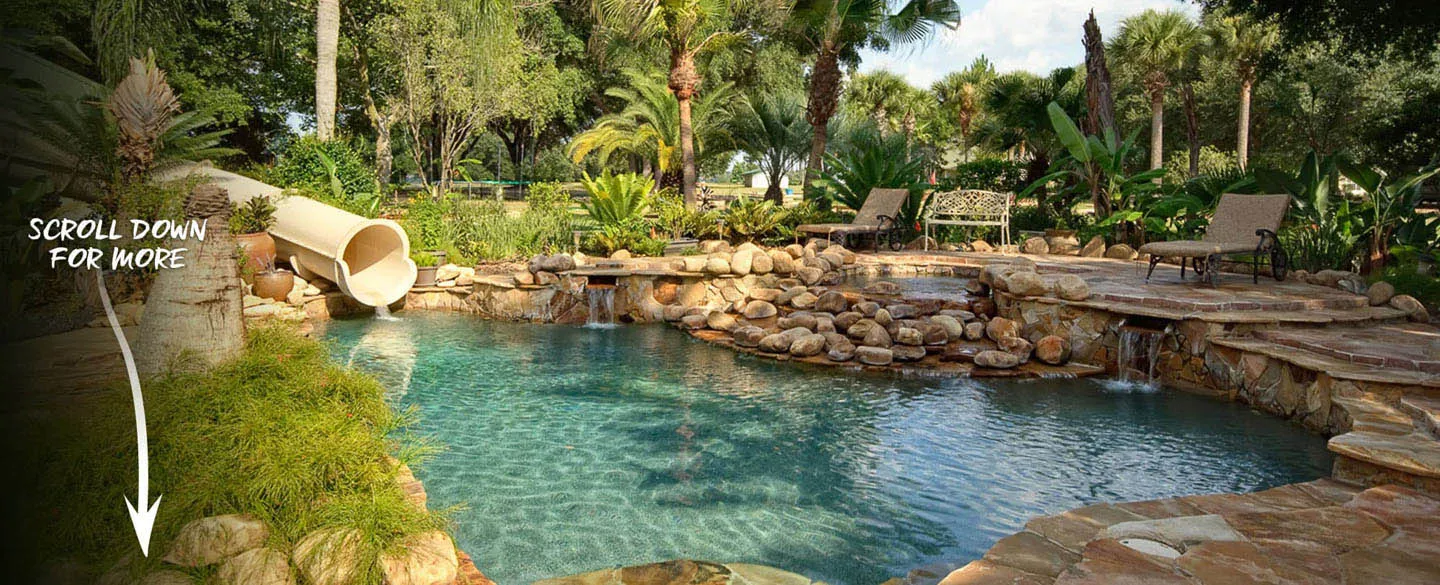 The Ever After Estate vacation home rental's lagoon waterfall pool and waterslide near Orlando, Florida