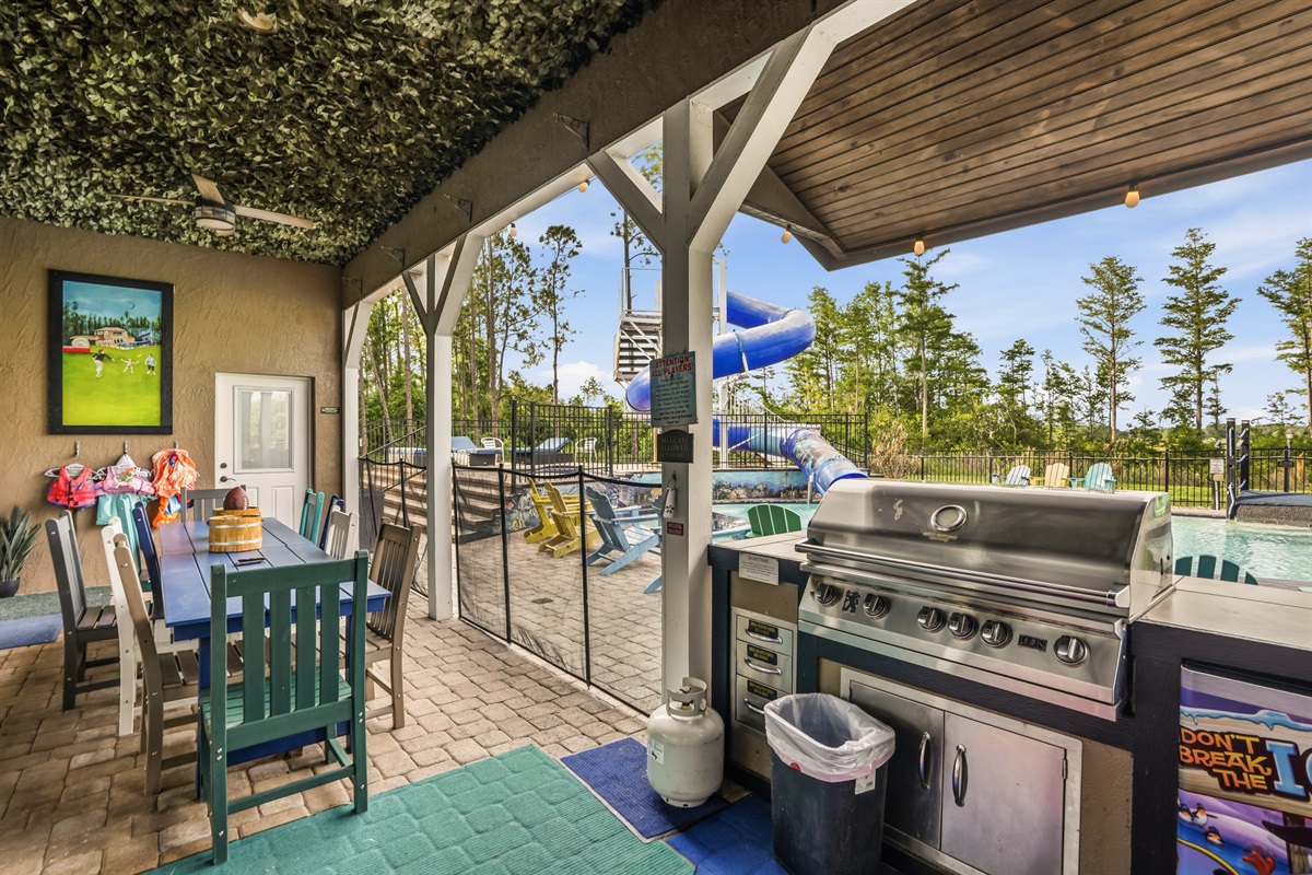 The covered outdoor kitchen patio.