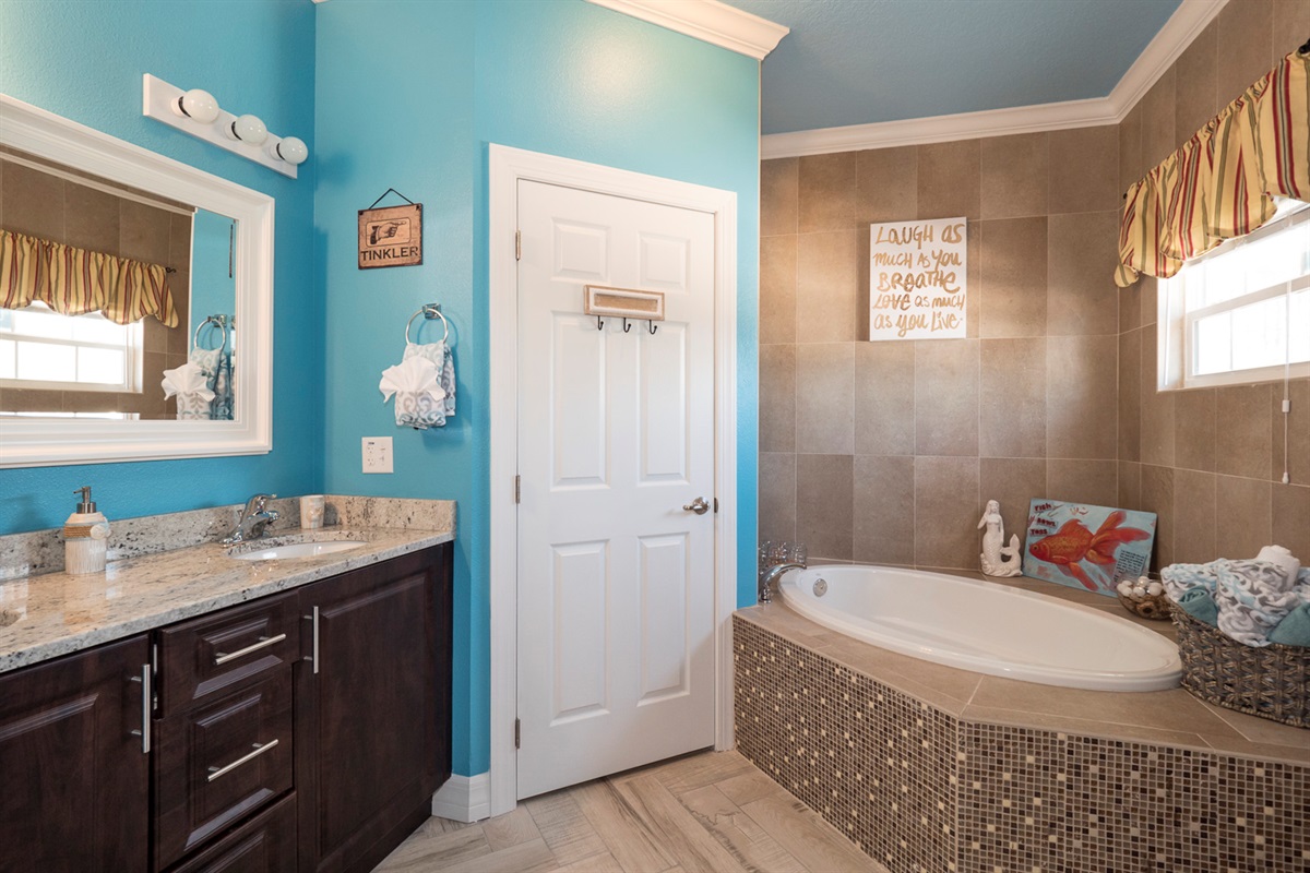 A bathroom with a soaking tub.