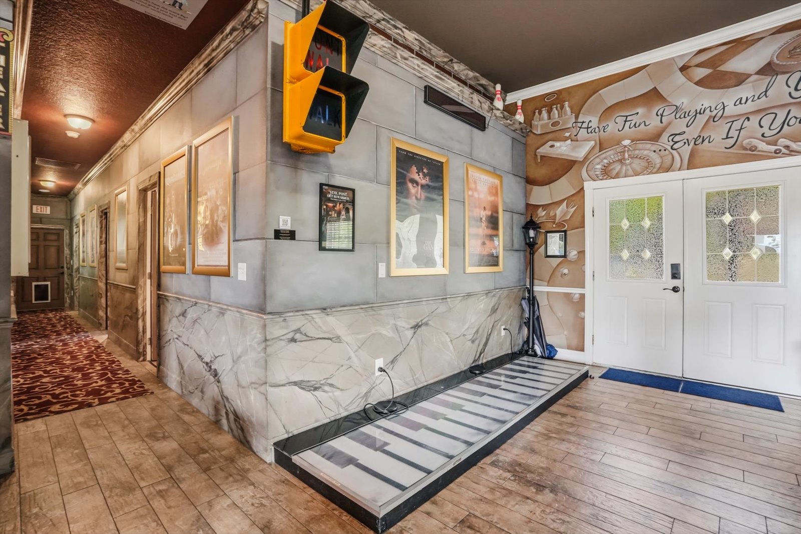The in-floor piano by the theater entrance