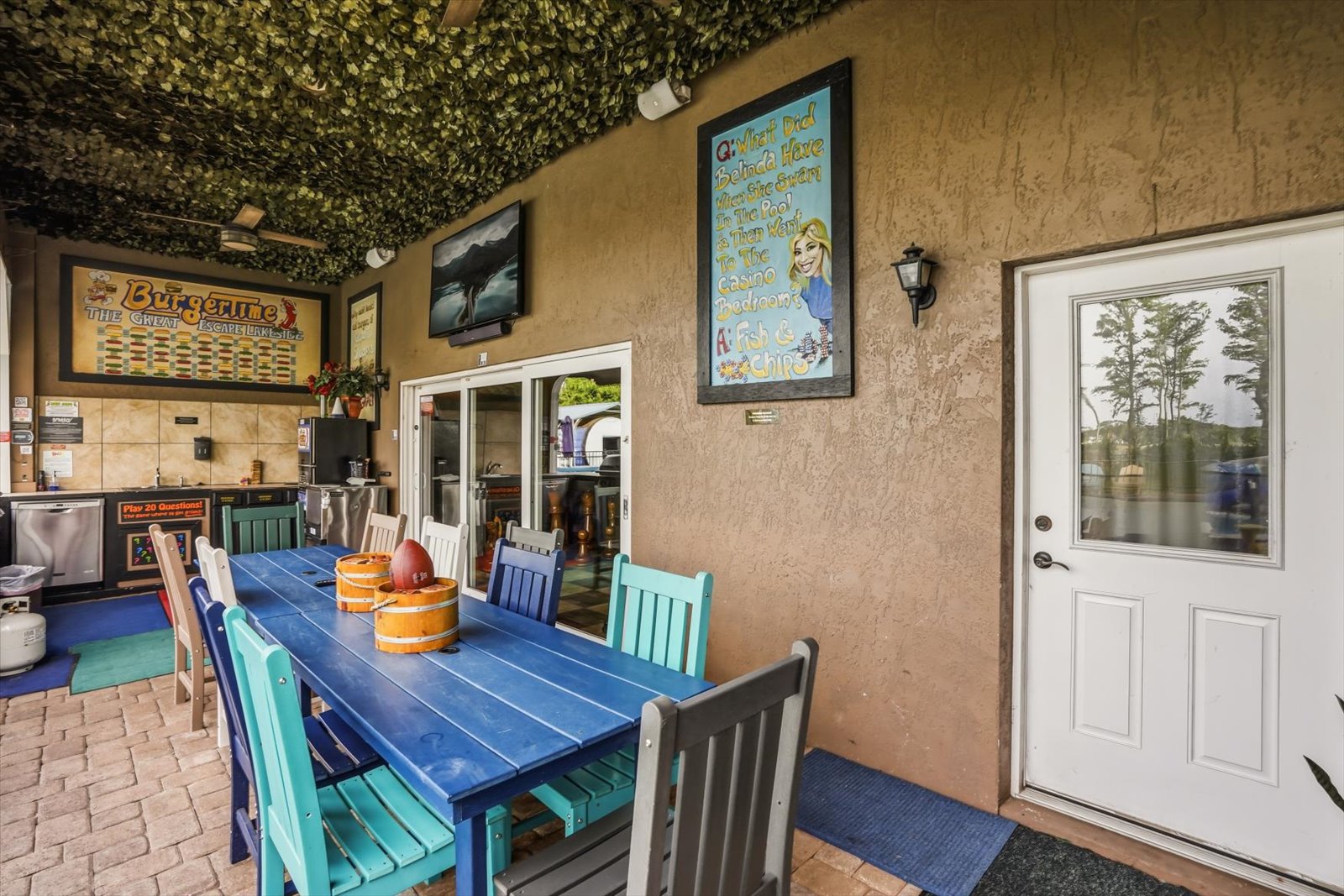 The covered dining patio off the outdoor kitchen