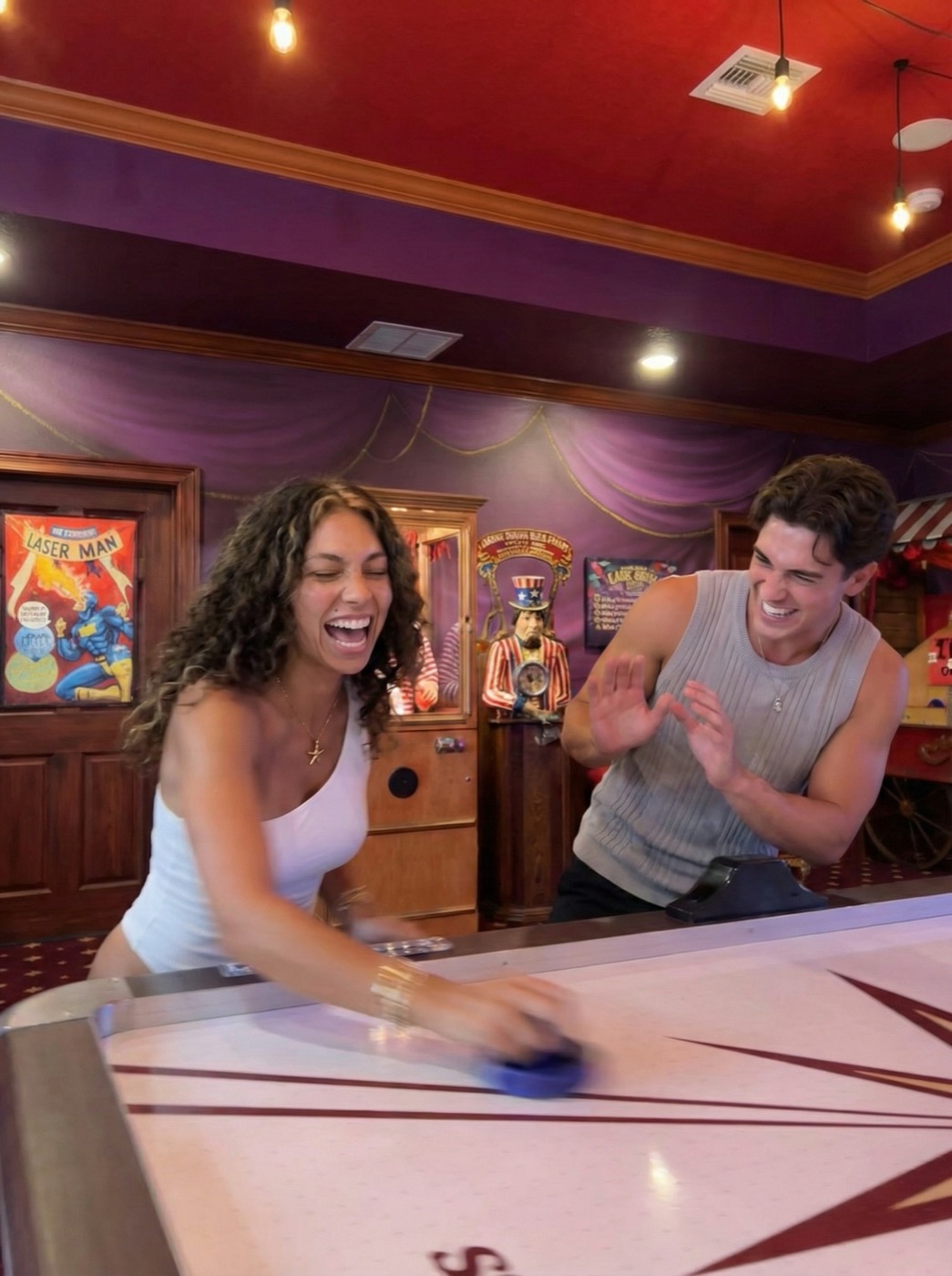 Shuffleboard laughs on the carnival midway.