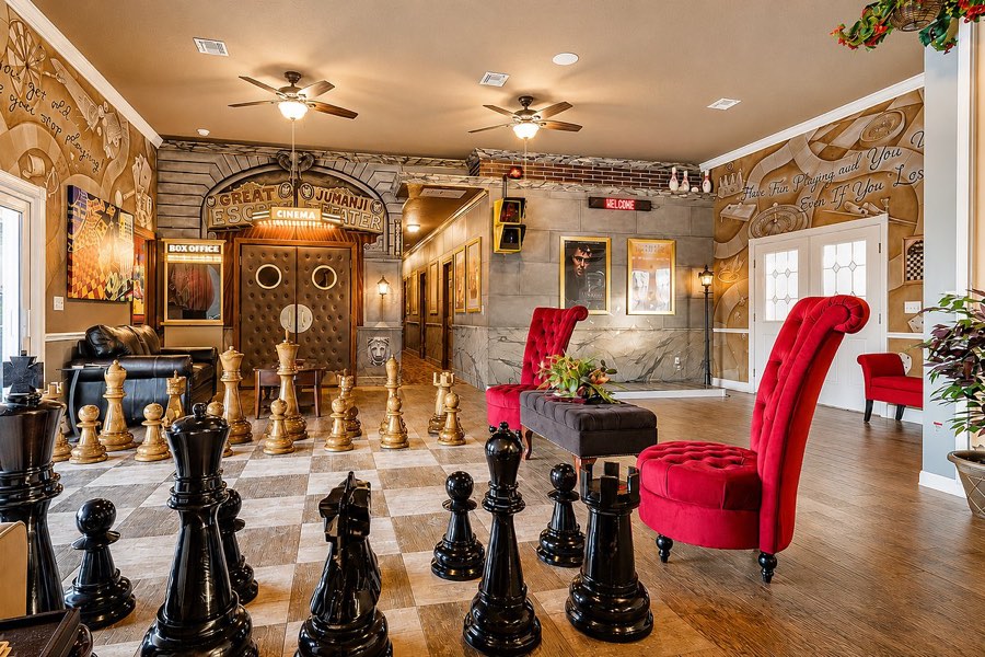 The teak chess set on the chessboard floor of the LIFE-ing room