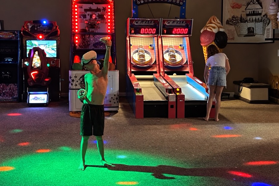 Kids ruling the arcade.