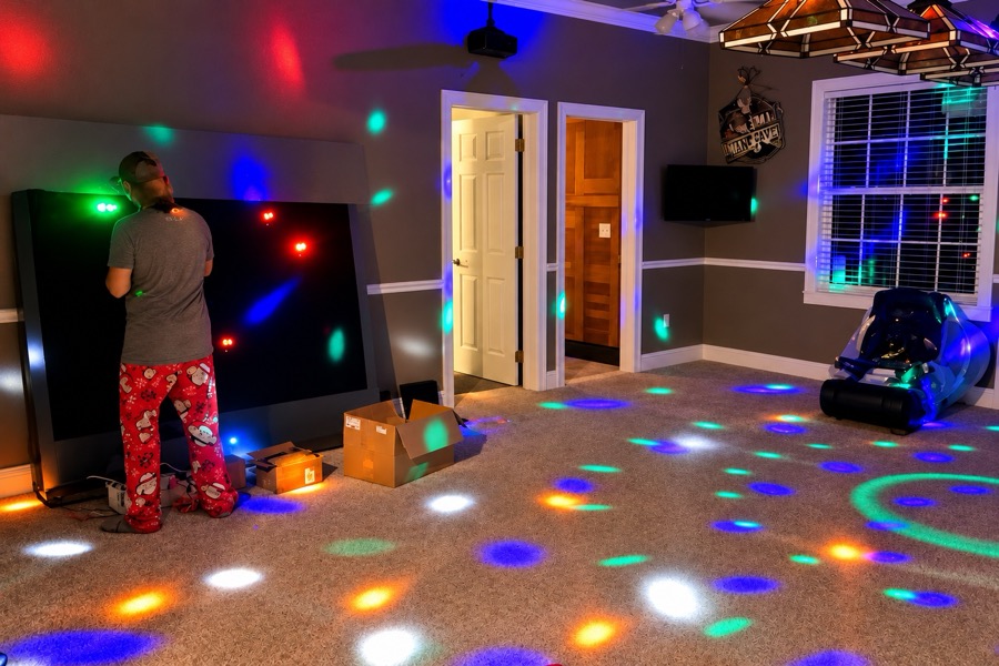 The nightclub dance floor under the lights.