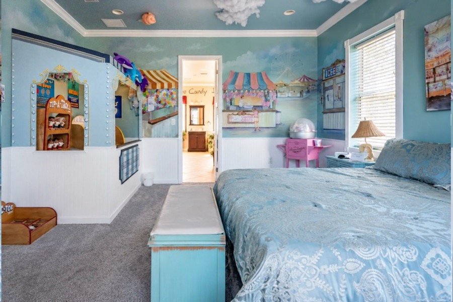 The Romantic Carnival Suite, king bed.