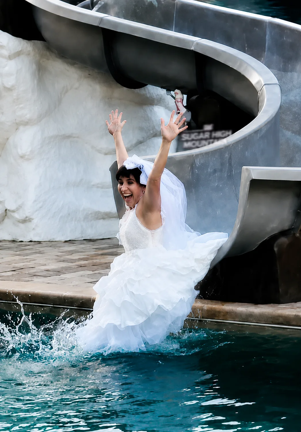 Down the grotto slide, in the gown